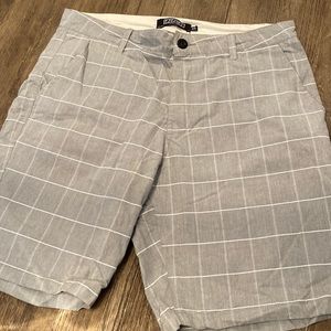 Men’s plaid flat front shorts